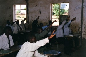 students raising hands
