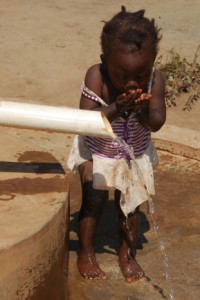 child at waterhole