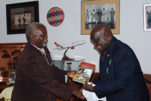 Dr. Tembo handing a copy to President Kaunda a copy of his book: “Satisfying Zambian Hunger for Culture”. The President wrote the foreword to the book.