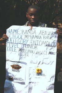 1.Abiudi Banda in Grade 9 when he was 15 years showing one of his projects in Entomology. He had made an insecticide from natural products; tobacco and 3 other ingredients from the bush.